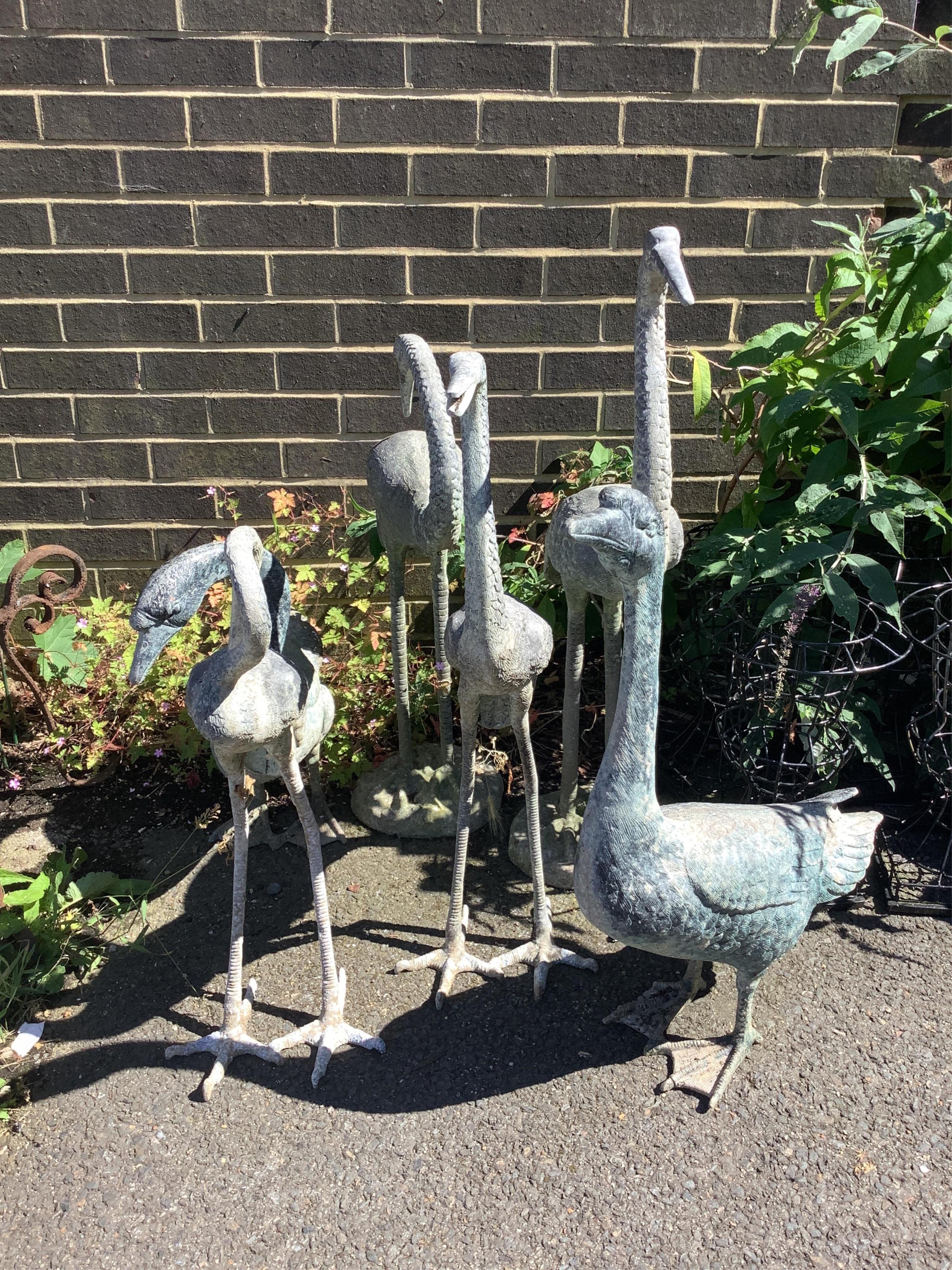 Six faux lead stork and geese garden ornaments, largest height 92cm. Condition - fair